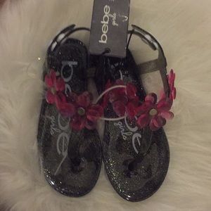 Kids Bebe jelly slippers.
